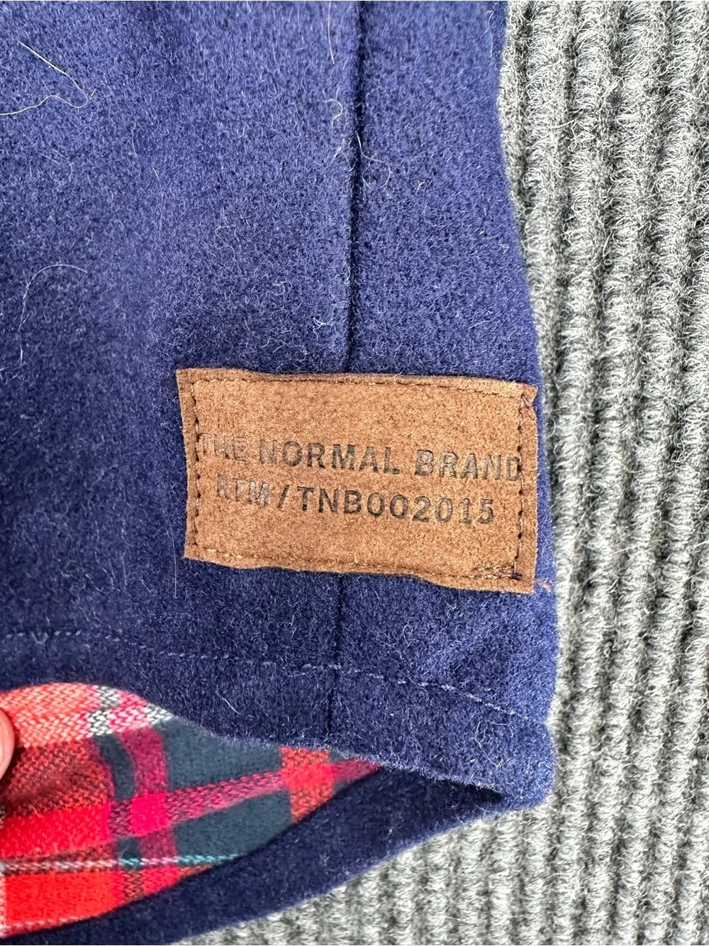The Normal Brand Navy Jacket with Red and Teal Plaid Lining